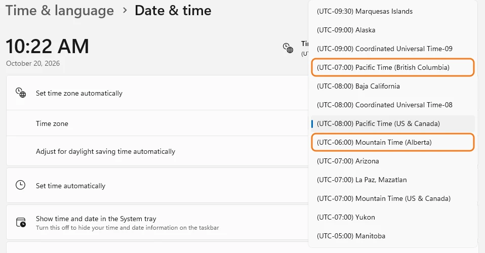 The Windows 11 time zone list open, with (UTC-07:00) Pacific Time (British Columbia) and (UTC-06:00) Mountain Time (Alberta) highlighted